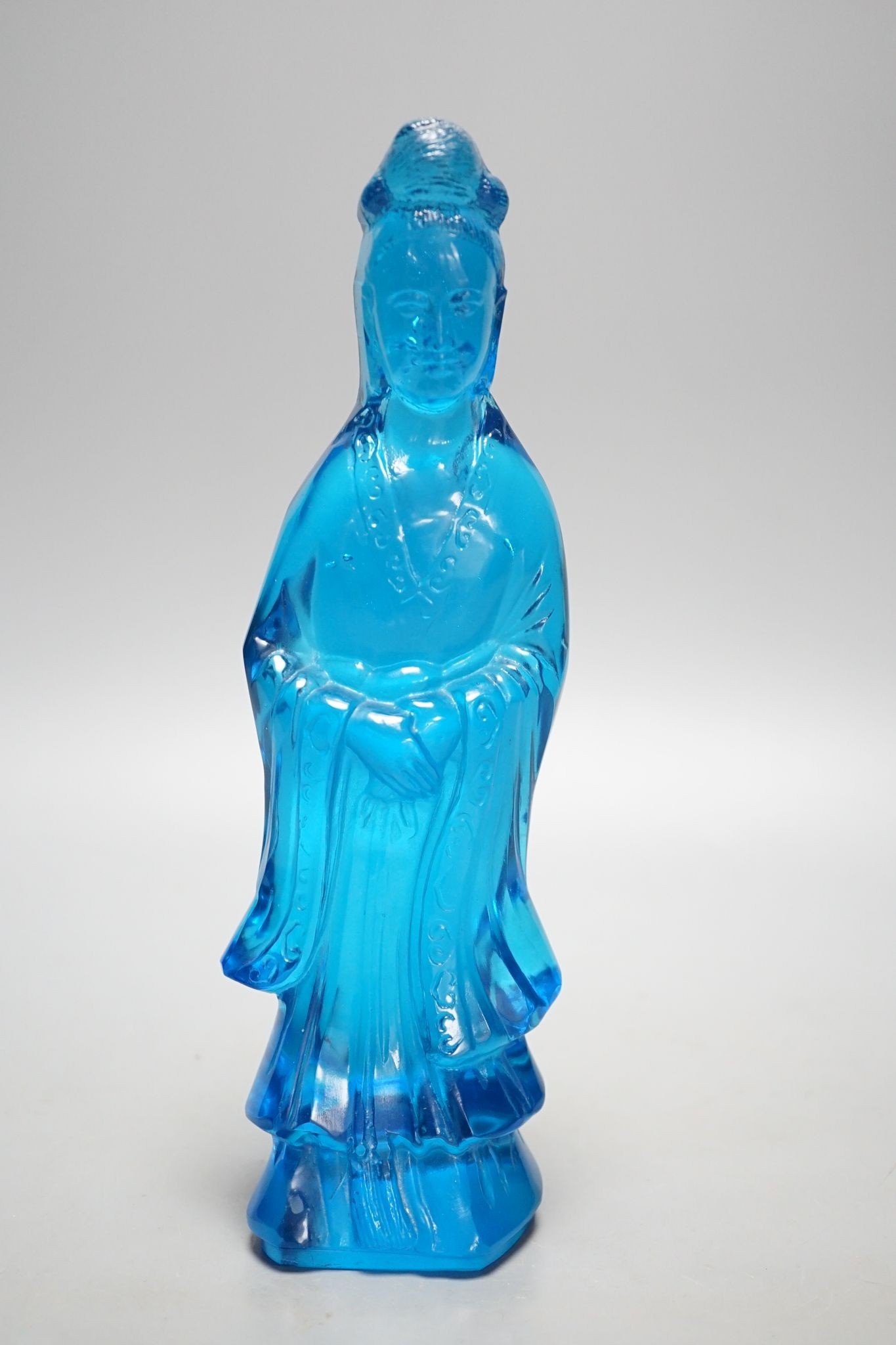 A Chinese blue glass figure of Guanyin 27cm